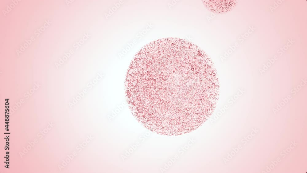 Pink drop with tiny clear bubbles of glycerine is dripped from dropper on pale pink background | Macro shot of skincare serum with glycerine and vitamins for its commercial