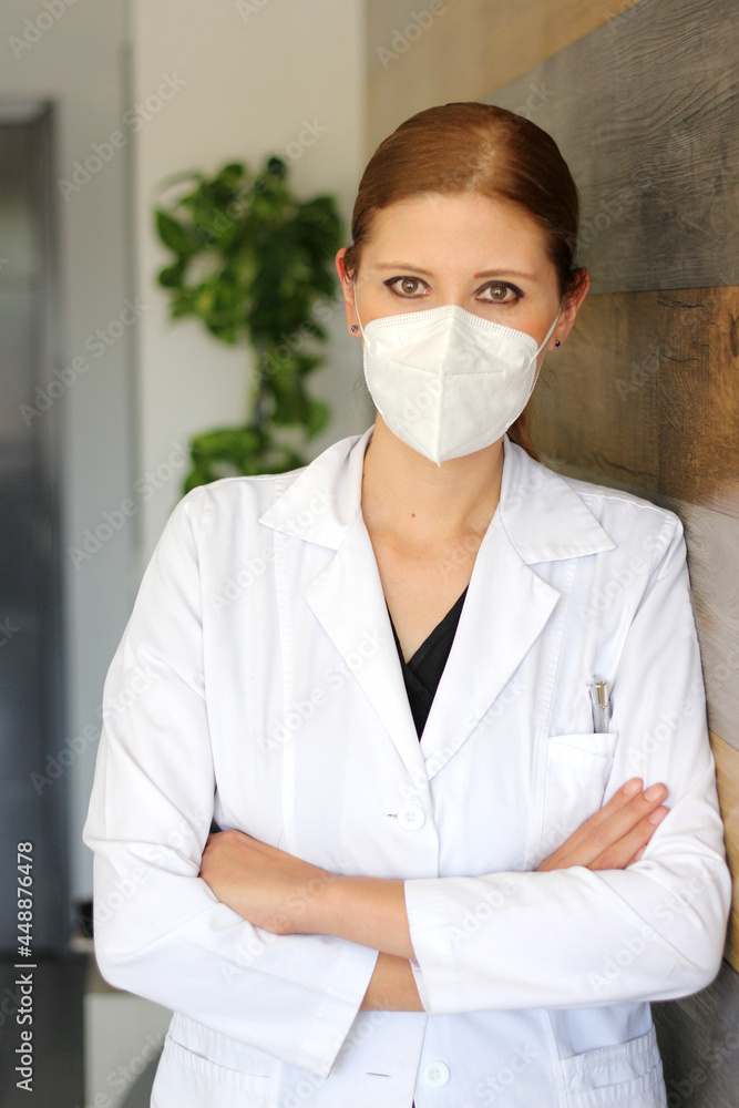 Woman specialist professional doctor with white coat and face mask ready to fight against Covid-19 or Coronavirus
Woman specialist professional doctor with white coat and face mask ready to fight against Covid-19 or Coronavirus