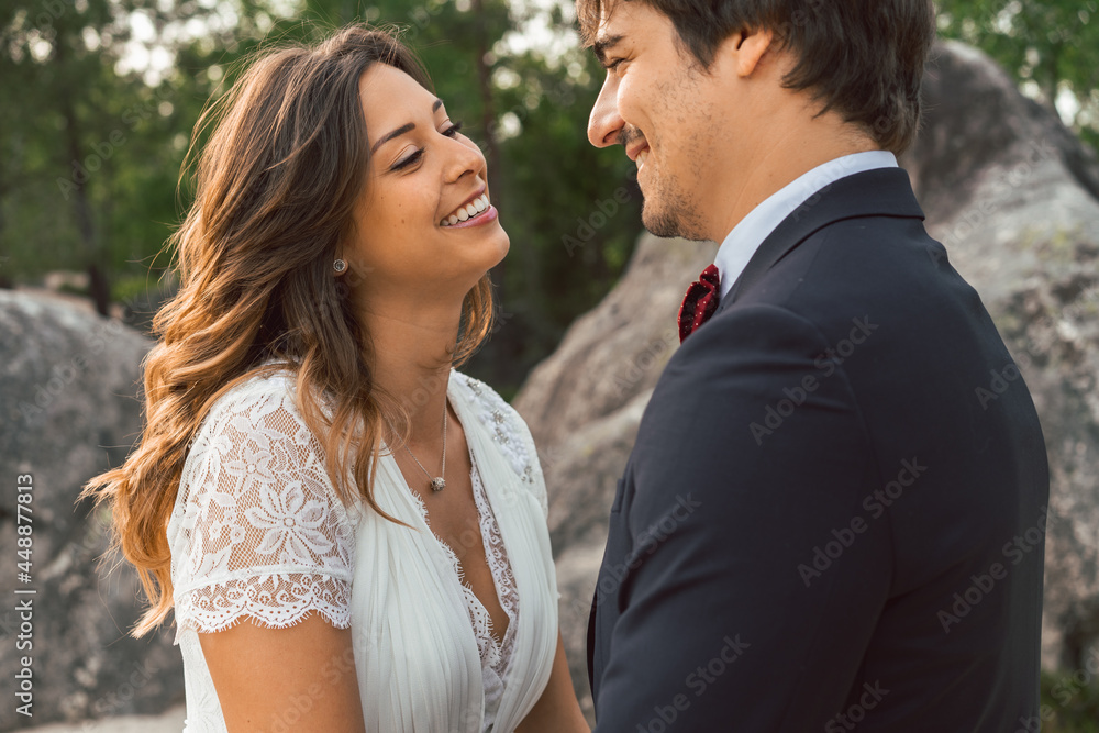 Bride and groom celebrating small wedding in nature Bride and groom celebrating small wedding in nature