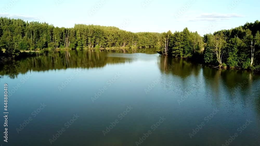 Aerial view of a river among forests at sunset in a rural area in Russia.
Aerial view of a river among forests at sunset in a rural area in Russia.