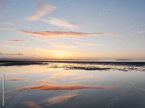 Sunset over Anglesey and Puffin Island. Llanfairfechan, Wales, UK. photo