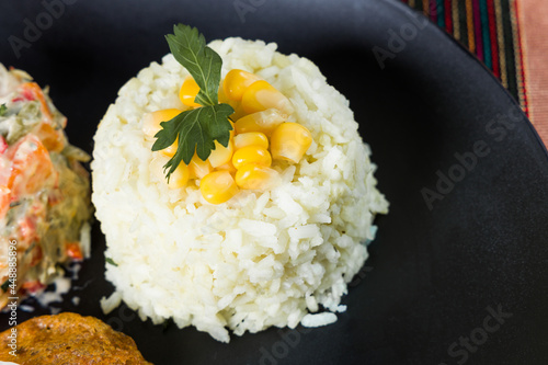 White rice served as guatemalan style with corn