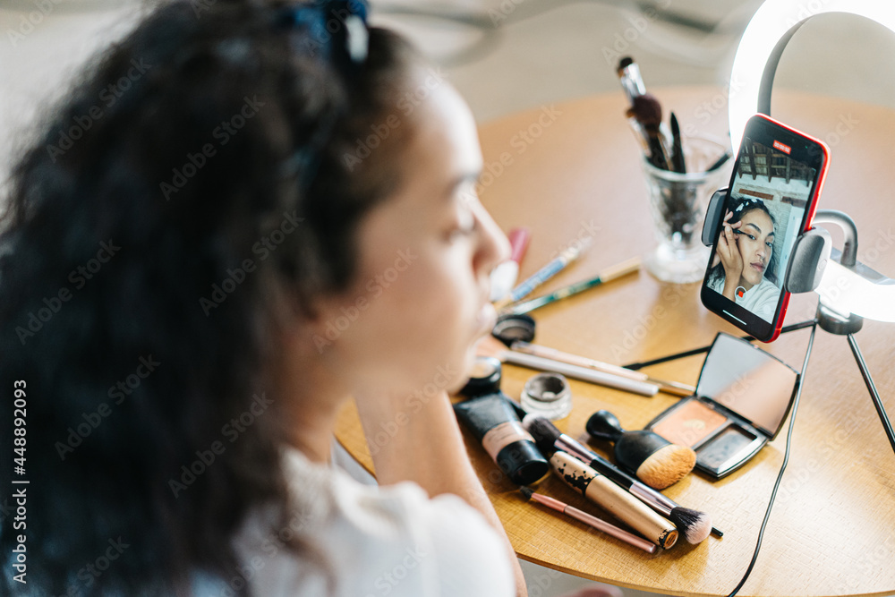 Beauty blogger recording video of makeup procedure Beauty blogger recording video of makeup procedure