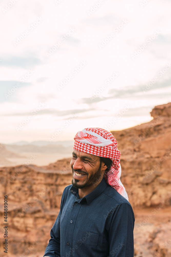 Arabic man smiling in the desert. Arabic man smiling in the desert.