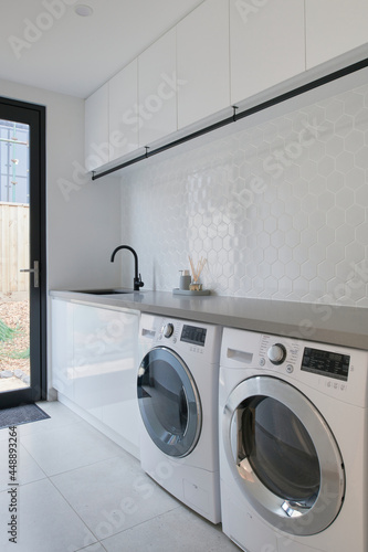 Large laundry with washer and dryer photo