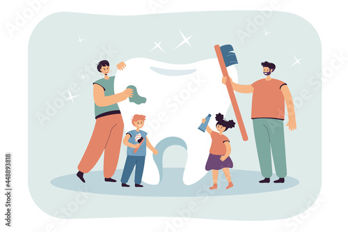 Happy family caring about big tooth together. Flat vector illustration. Parents and kids brushing, cleaning molar with oral cavity hygiene products. Dental care, health, hygiene, family concept