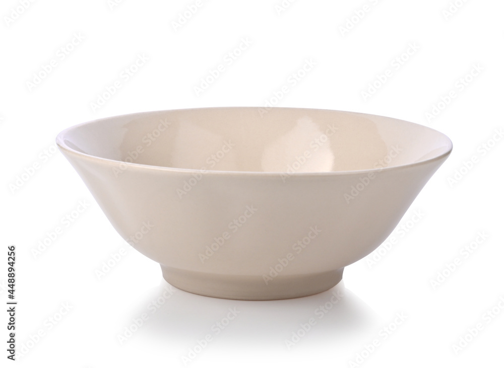 Beige ceramic bowl or ramekin isolated on a white background. Beige ceramic bowl or ramekin isolated on a white background.