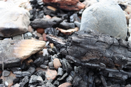 fire wood charred rocks, stones 