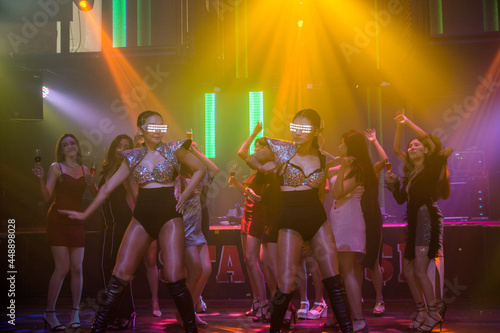 Group woman dancing in night party happy new year concept