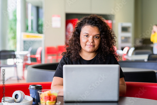  aboriginal woman using computer photo