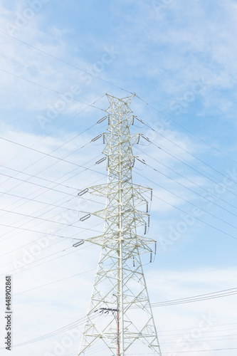 Blue sky and transmission tower photo