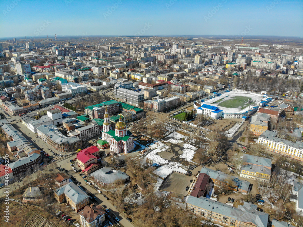 Aerial view of the church and stadium in spring (Kirov, Russia)