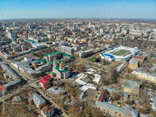 Aerial view of the church and stadium in spring  Kirov  Russia 