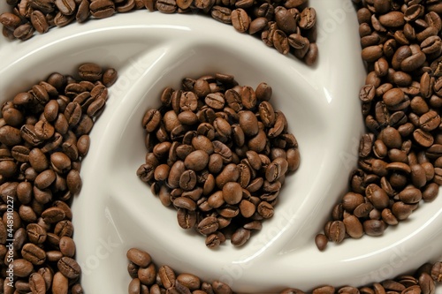 Roasted coffee beans.Arabica coffee. Morning traditional  drink. Coffee beans texture.Invigorating drink ingredients 
