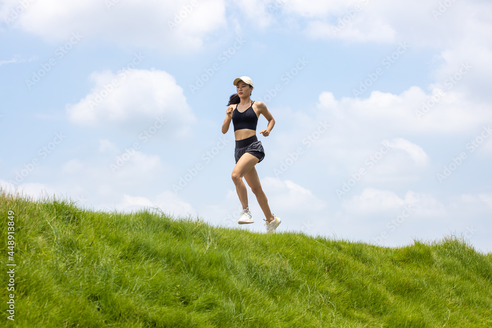 Young Asian girls running in the morning for fitness