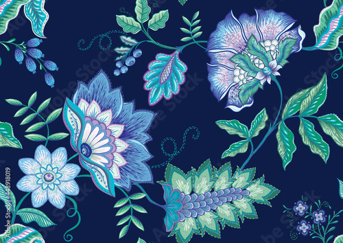 Fototapeta Naklejka Na Ścianę i Meble -  Seamless pattern with stylized ornamental flowers in retro, vintage style. Jacobin embroidery. Colored vector illustration on navy blue background.