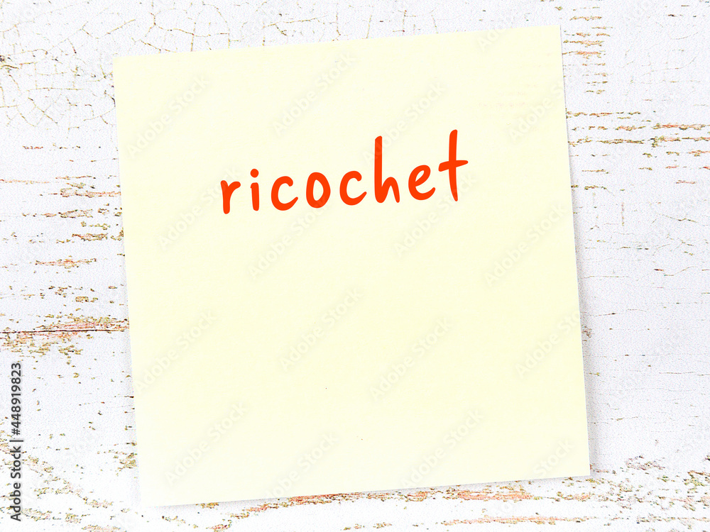 Yellow sticky note on wooden wall with handwritten word ricochet - obrazy, fototapety, plakaty 