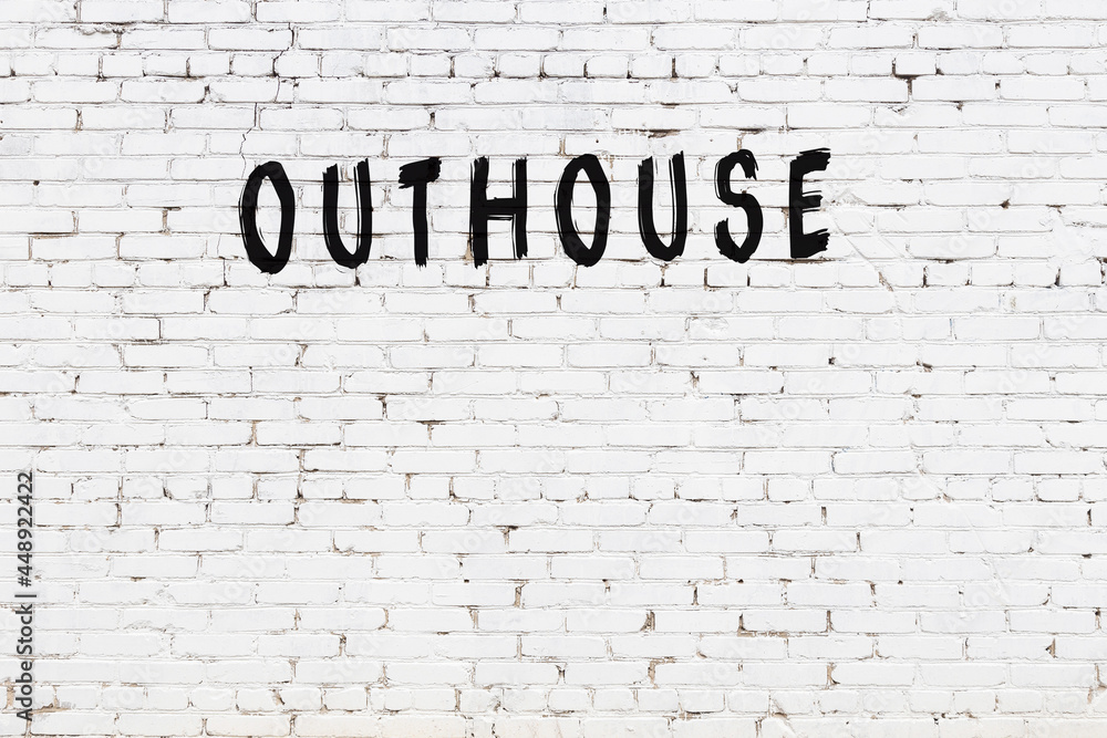 Inscription outhouse painted on white brick wall - obrazy, fototapety, plakaty 