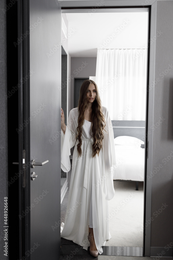 The bride in a white dress, fees at the hotel. A stylish wedding in the European style. The bride in a white dress, fees at the hotel. A stylish wedding in the European style.