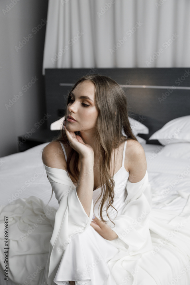 The bride in a white dress, fees at the hotel. A stylish wedding in the European style. The bride in a white dress, fees at the hotel. A stylish wedding in the European style.