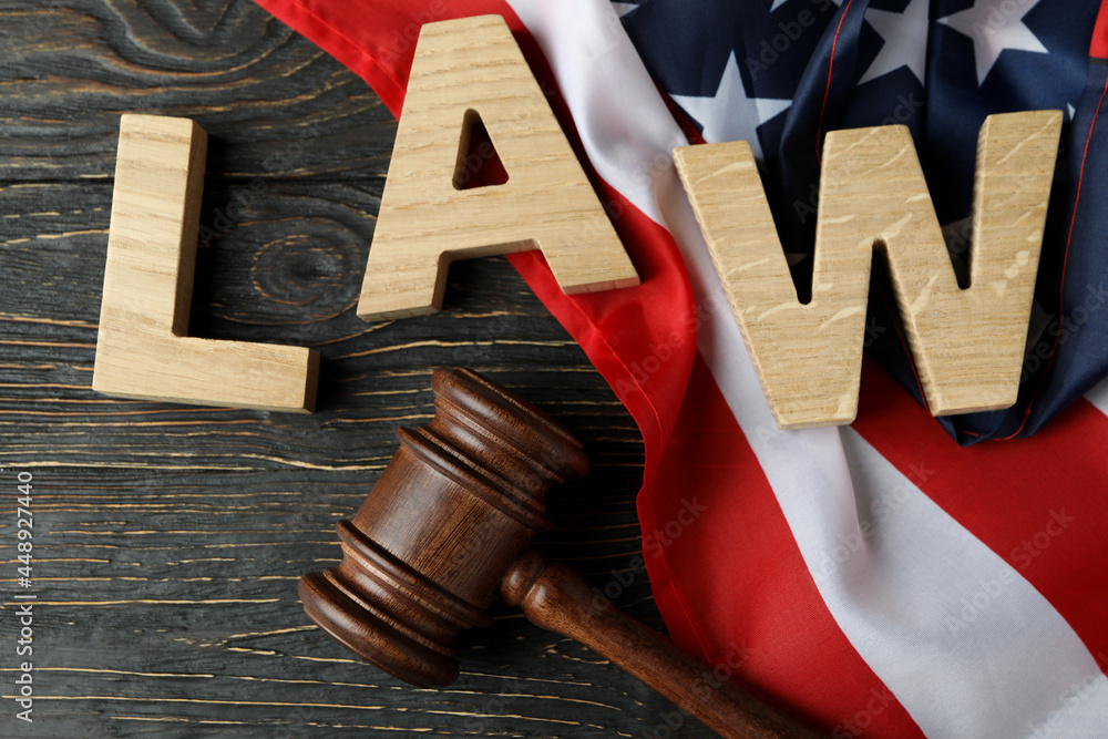 Fototapeta premium American law concept with judge gavel on wooden background