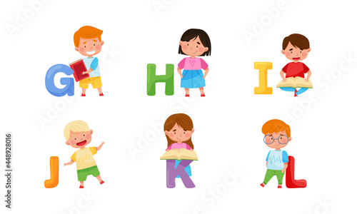 Cheerful Kids Standing with Big Alphabet Letters Vector Set