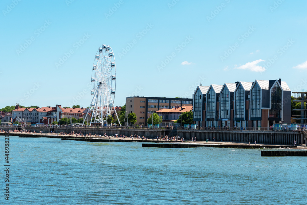 Zelenogradsk, Kaliningrad Region, Russia, June 2021. The coastal resort line of the city. A new Ferris wheel.