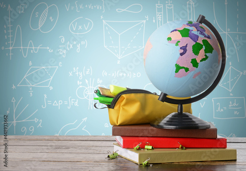 Globe with books and school...