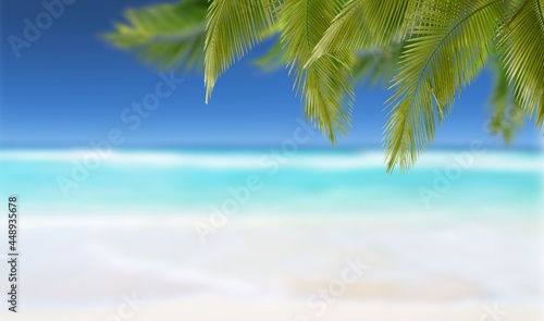 Sand with blurred Palm and tropical beach bokeh background 