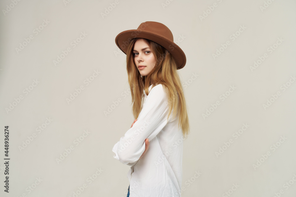woman wearing hat white shirt studio posing light background woman wearing hat white shirt studio posing light background