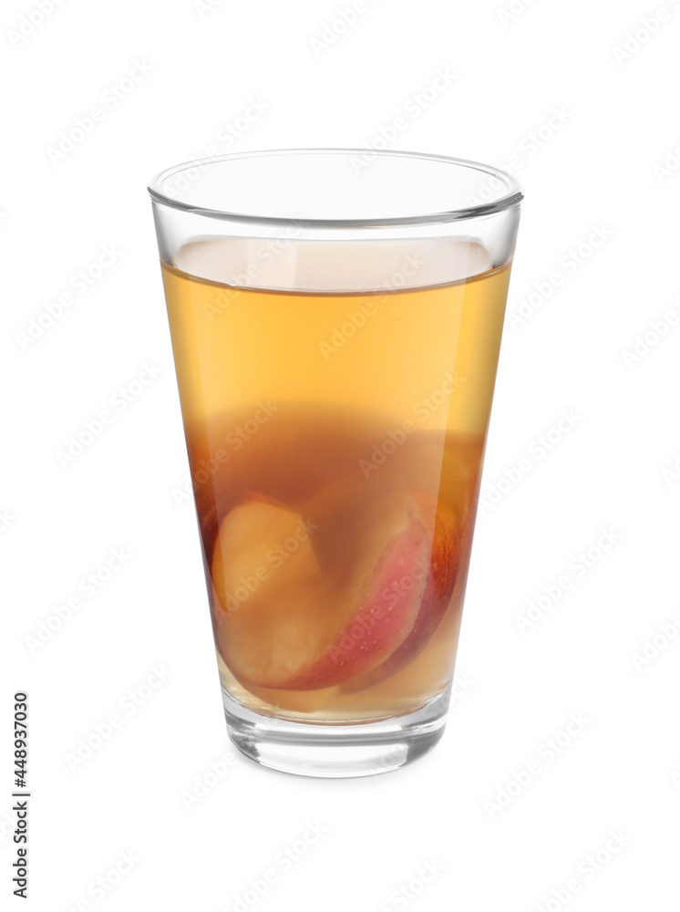 Delicious compot with dried apple slices in glass on white background Delicious compot with dried apple slices in glass on white background