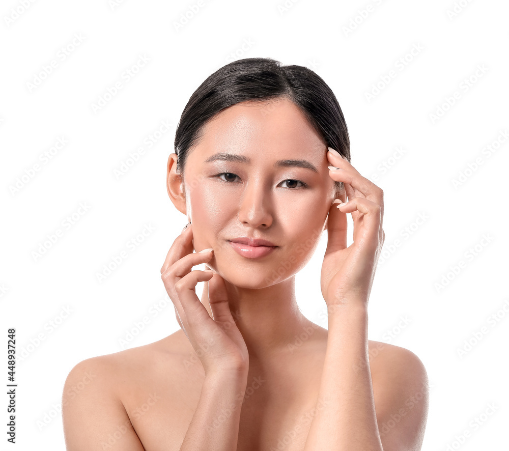 Beautiful young woman on white background