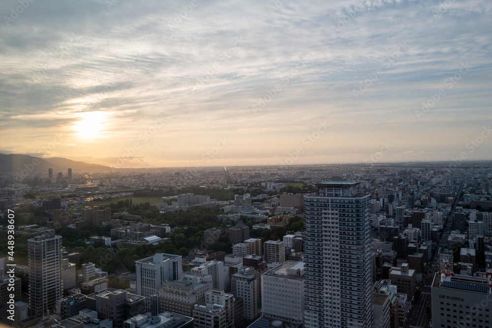 札幌の展望台から見た夕日の町並みの風景 A view of the city at sunset from the observatory in Sapporo