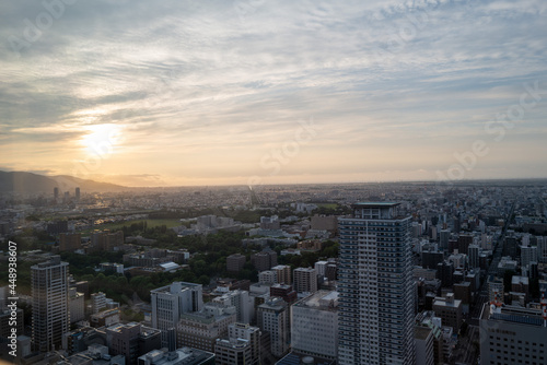 札幌の展望台から見た夕日の町並みの風景 A view of the city at sunset from the observatory in Sapporo