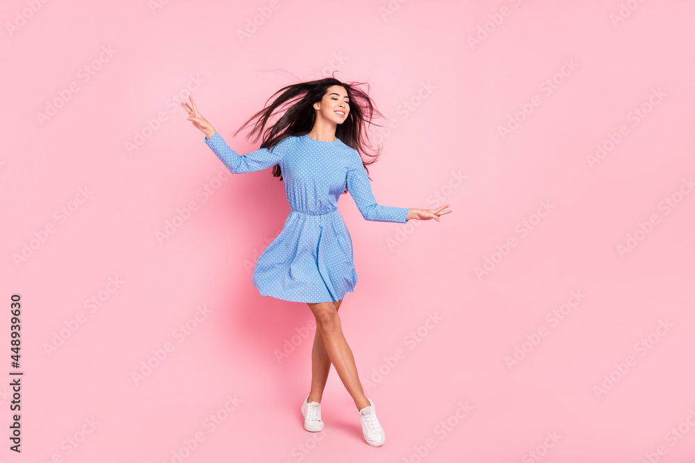 Full length photo of young lovely girl happy positive smile pretty cute elegant isolated over pastel color background Full length photo of young lovely girl happy positive smile pretty cute elegant isolated over pastel color background