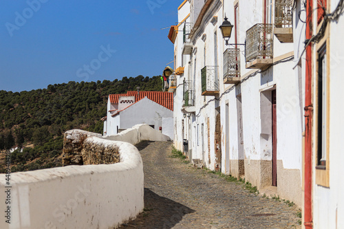 Fototapeta Naklejka Na Ścianę i Meble -  Typical narrow street in the ancient town of Mertola, Alentejo Region, Portugal.