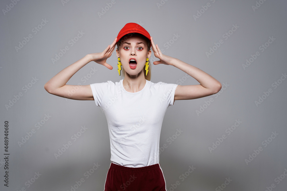 cheerful girl in red cap mesh decoration posing summer fashion cheerful girl in red cap mesh decoration posing summer fashion