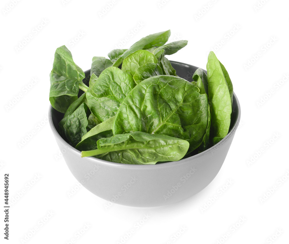 Bowl with fresh spinach leaves on white background Bowl with fresh spinach leaves on white background