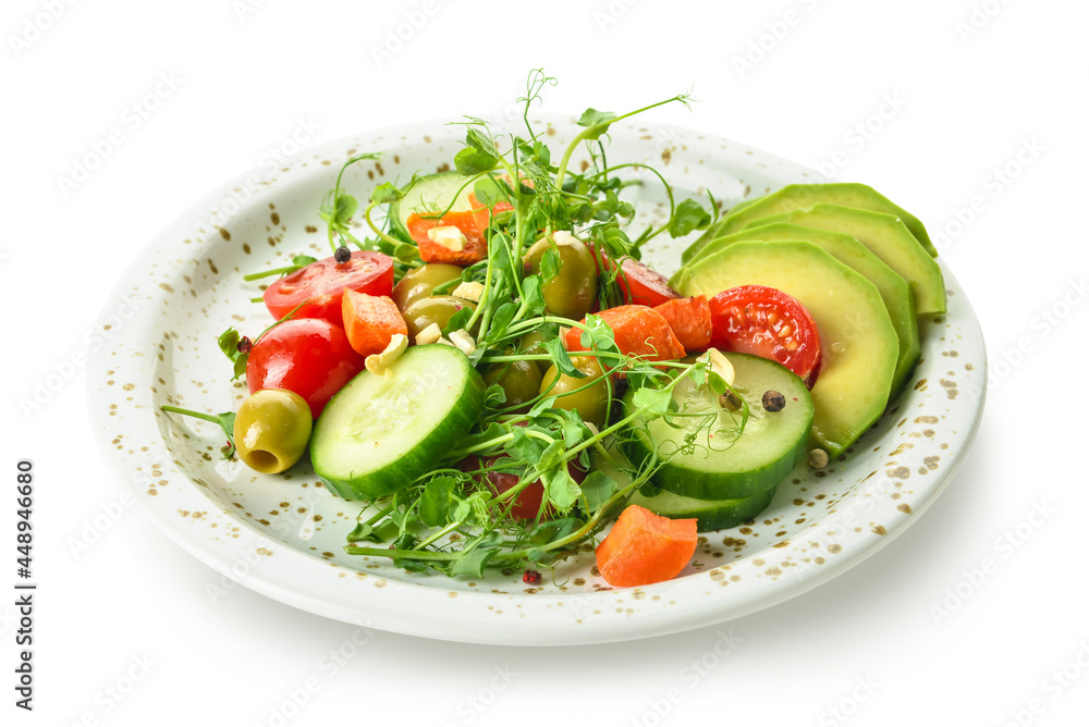 Plate with delicious fresh vegetable salad on white background