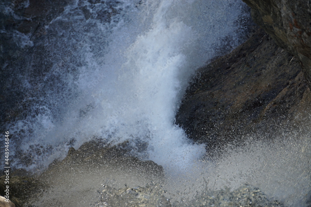 closeup of water flowing over rocks closeup of water flowing over rocks