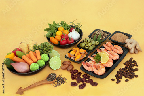 Fototapeta Naklejka Na Ścianę i Meble -  Flexitarian healthy lifestyle food high in protein, omega 3,  antioxidants, anthocyanins, fibre. Vegetables, seafood, herbs, spice, dietary supplement powders, nuts, seeds. Health food concept.