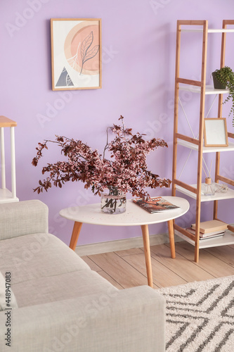 Vase with blossoming branch...