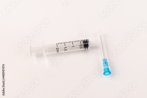 Medical plastic disposable syringe with needle. Applicable for vaccination.