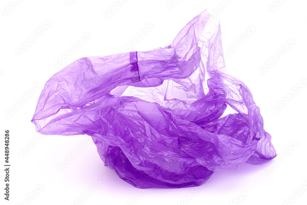 Closeup of used purple plastic disposable bag on white  background