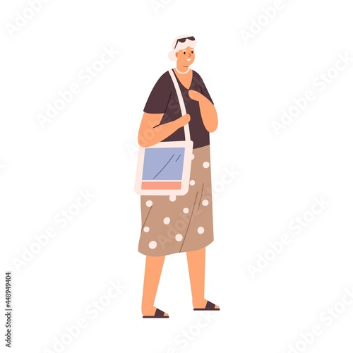 Aged gray-haired woman walking. Happy senior female strolling. Modern elderly...