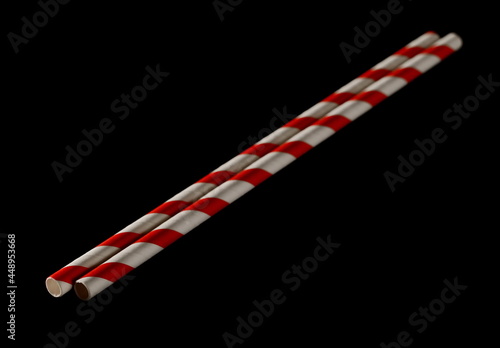 Paper drinking straw, eco friendly isolated on black background with clipping path