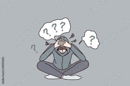 Depression and mental disorder concept. Young depressed sad frustrated teen sitting touching head having questions and problems in mind vector illustration 