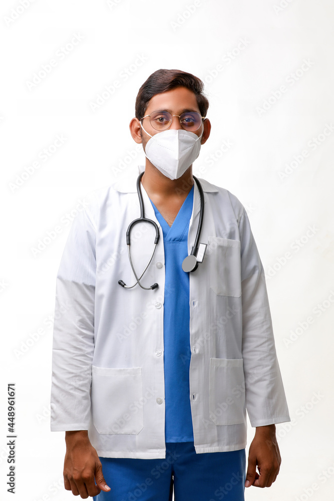 Handsome male doctor standing on white background. Handsome male doctor standing on white background.