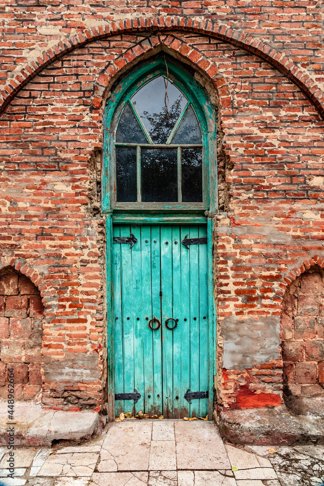Antique wooden door of the entrance to mosque