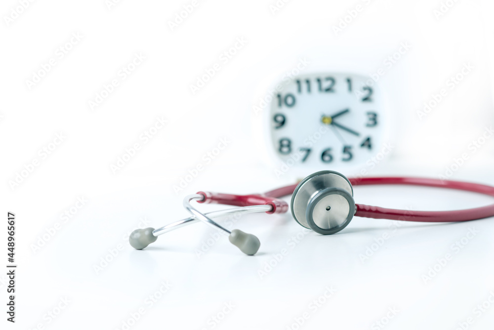 stethoscope with clock on white background. stethoscope with clock on white background.